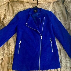 Blue coat size L. zipper goes diagonal - only worn once.